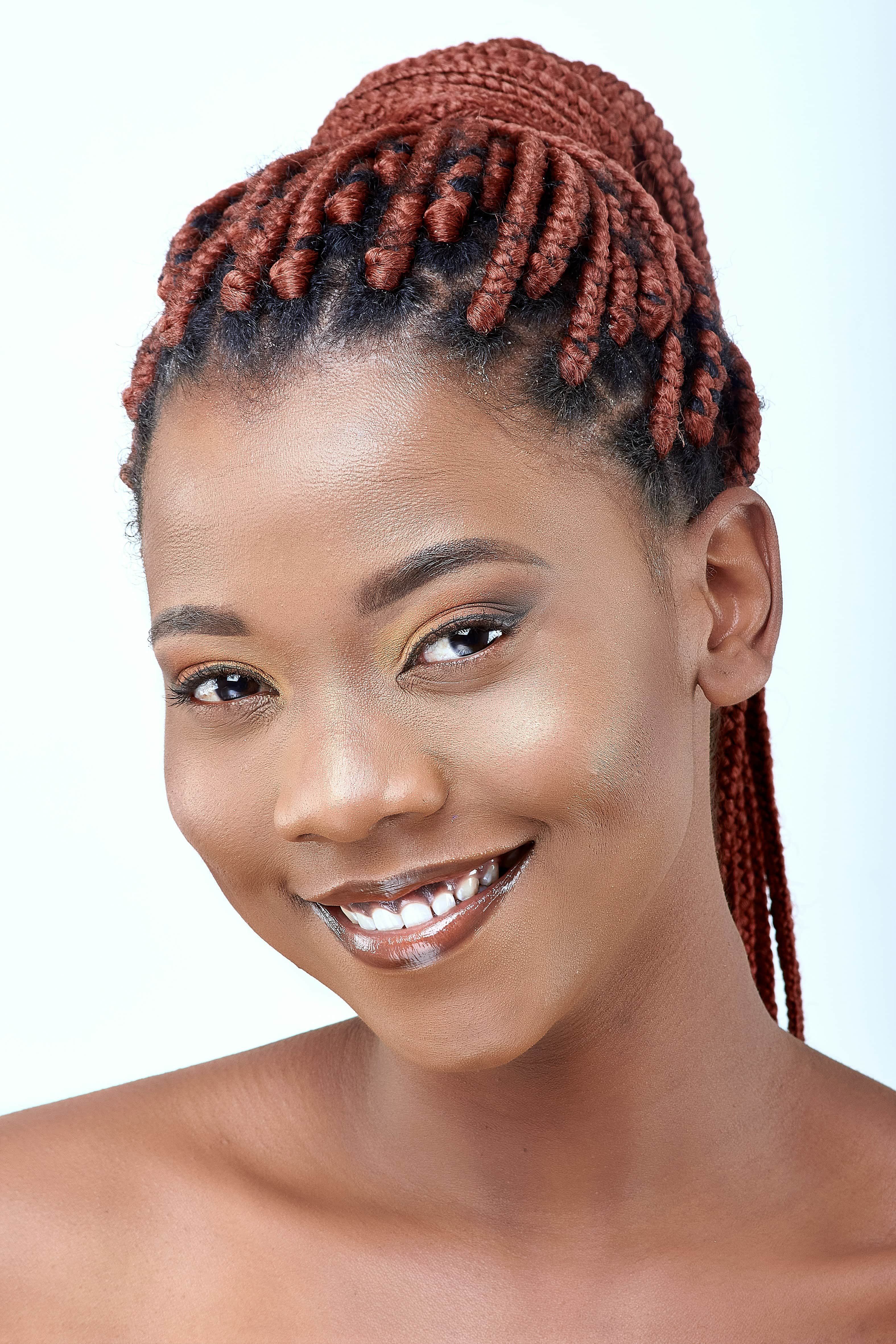 Auburn braided updo styling